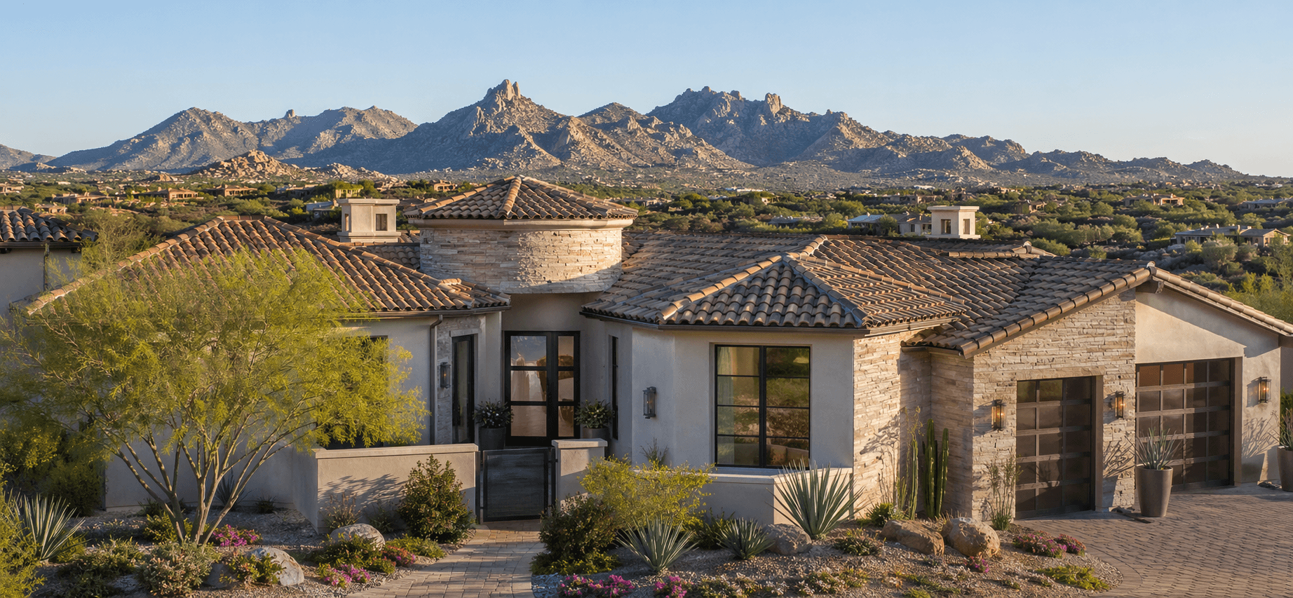 Scottsdale home with tile roof and mountain backdrop.